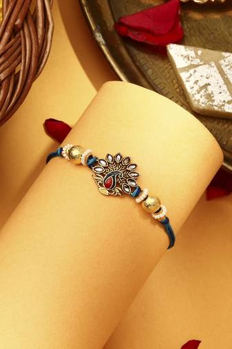 Peacock rakhi with kundan stones