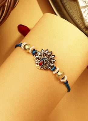 Peacock rakhi with kundan stones 2