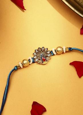 Peacock rakhi with kundan stones 3
