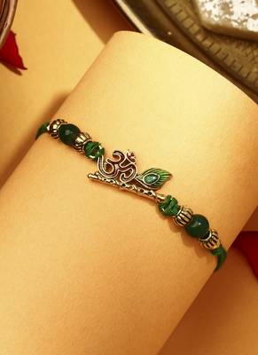 Om with flute & peacock feature rakhi 2