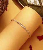 American stone studded rakhi with peach thread