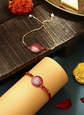 Elegant pink rakhi with golden lotus painted bhaiya bhabhi set 1