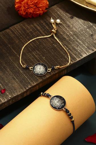 Elegant blue rakhi with golden lotus painted bhaiya bhabhi set