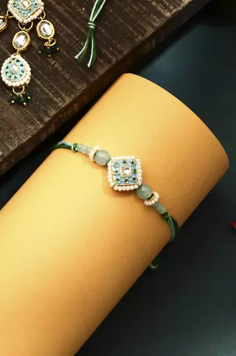 Green meenakari with kundan studded bhaiya bhabhi rakhi