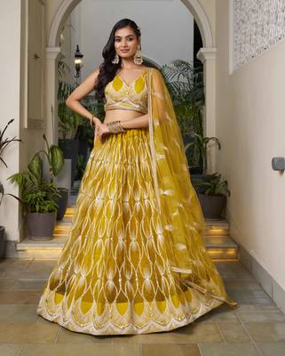 MUSTARD YELLOW NET FABRIC LAHENGA WITH SEQUINS AND THREAD EMBROIDERY WORK 1