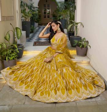 MUSTARD YELLOW NET FABRIC LAHENGA WITH SEQUINS AND THREAD EMBROIDERY WORK 3