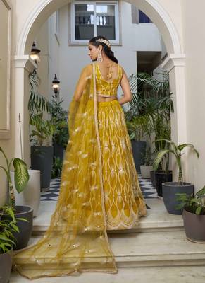 MUSTARD YELLOW NET FABRIC LAHENGA WITH SEQUINS AND THREAD EMBROIDERY WORK 5