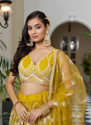 MUSTARD YELLOW NET FABRIC LAHENGA WITH SEQUINS AND THREAD EMBROIDERY WORK 6