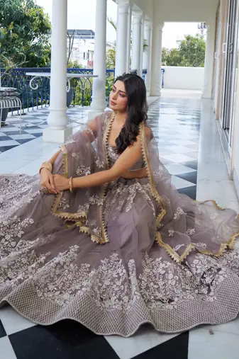 LIGHT DUSTY BROWN  NET FABRIC LAHENGA WITH SEQUINS AND THREAD EMBROIDERY WORK