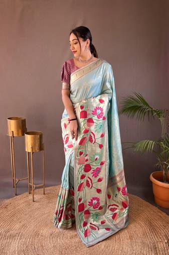 Sky Paithani style zari border silk bland Floral weaaving saree with Blouse