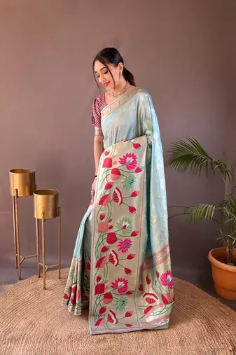 Sky Paithani style zari border silk bland Floral weaaving saree with Blouse