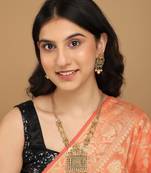 Mansiyaorange matte golden floral design kundan stones long jewellery sets for women