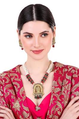 Mansiyaorange matte gold  long radha krishna playing bansuri jewelry set with earrings 1