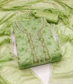 Beautifully handcrafted green colour faux cotton salwar kameez for graceful fancy looks in party style
