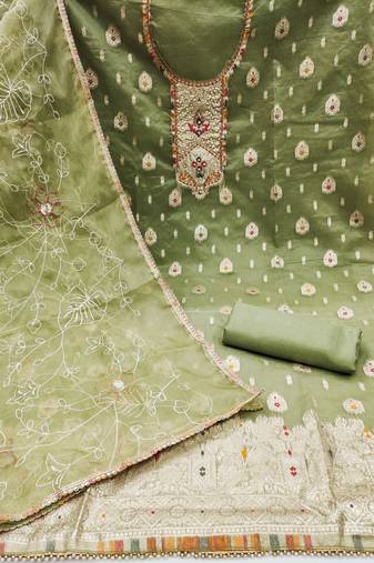 Beautifully handcrafted green colour organza salwar kameez for graceful designer fancy looks in party style