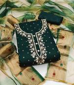Beautifully handcrafted green colour art silk salwar kameez for graceful festive looks in trendy style
