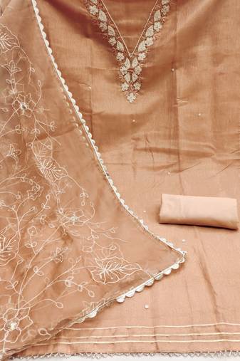 Beautifully handcrafted peach colour art silk salwar kameez for graceful festive looks in trendy style