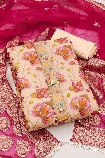 Beautifully handcrafted peach colour organza salwar kameez for graceful festive looks in girlish style