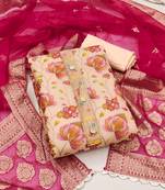 Beautifully handcrafted peach colour organza salwar kameez for graceful festive looks in girlish style