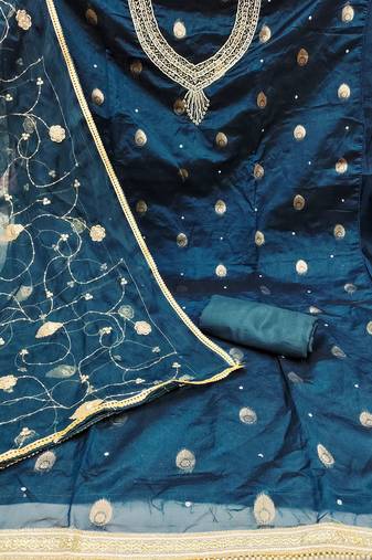 Beautifully handcrafted blue colour organza salwar kameez for graceful girlish looks in festive style