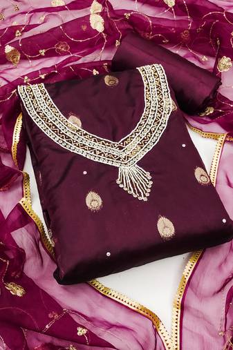 Beautifully handcrafted violet colour organza salwar kameez for graceful girlish looks in festive style