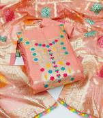 Beautifully handcrafted peach colour organza salwar kameez for graceful woven designer looks in ethnic style