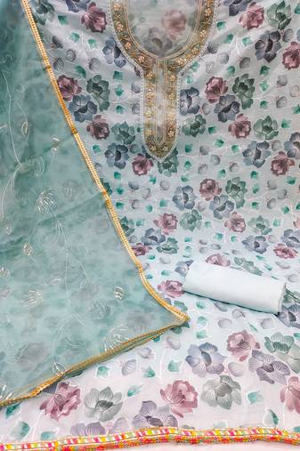 Beautifully handcrafted blue colour organza salwar kameez for graceful floral looks in festive style