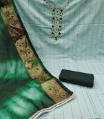 Beautifully handcrafted green colour cotton silk salwar kameez for graceful formal looks in festive style