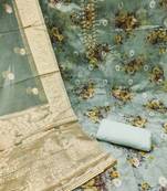 Beautifully handcrafted blue colour organza salwar kameez for graceful floral looks in party style