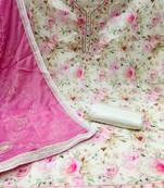 Beautifully handcrafted off white colour cotton silk salwar kameez for graceful festive looks in floral style