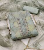 Beautifully handcrafted green colour organza salwar kameez for graceful party looks in girlish style