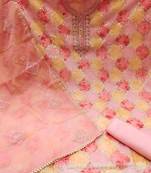 Beautifully handcrafted peach colour organza salwar kameez for graceful party looks in girlish style