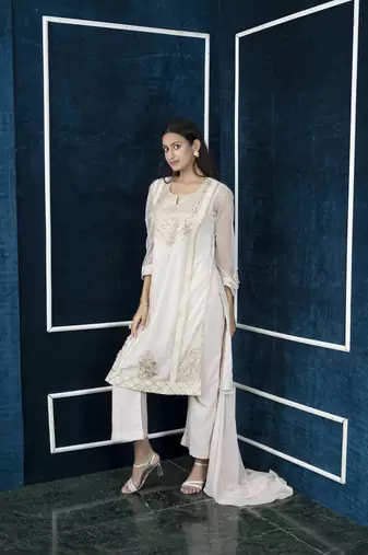 Nikhaar beige embroidered net stitched palazzo kurta & dupatta 