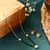 Delicate Black Bead Necklace with Transparent Circle Pendant