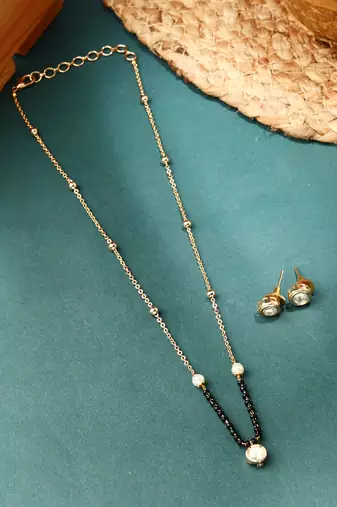 Delicate Black Bead Necklace with Transparent Circle Pendant