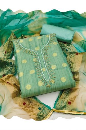 Handcrafted ethnic green colour faux cotton salwar kameez for graceful festive looks in girlish style