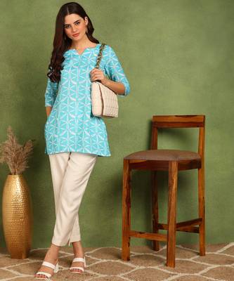 Turquoise printed poly rayon short kurti for women and girls 1