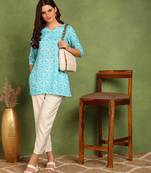 Turquoise printed poly rayon short kurti for women and girls