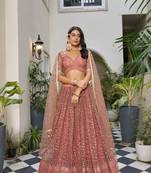 Rust Heavy Embroidery Net Semi Stitch A Line Lehenga With Blouse