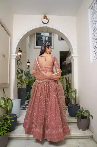 Rust Heavy Embroidery Net Semi Stitch A Line Lehenga With Blouse