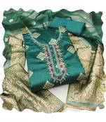 Handcrafted glamorous green colour art silk salwar kameez for graceful graceful party looks in trendy style
