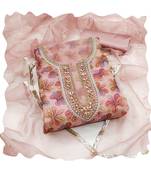 Handcrafted glamorous peach colour organza salwar kameez for graceful floral looks in graceful style