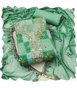 Handcrafted glamorous green colour art silk salwar kameez for graceful fancy looks in girlish style