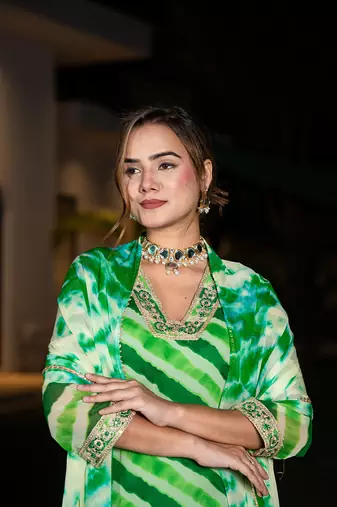  green leheriya print poly georgette straight suit set