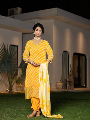  yellow leheriya print poly georgette straight suit set 1