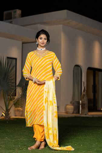  yellow leheriya print poly georgette straight suit set