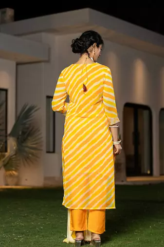  yellow leheriya print poly georgette straight suit set