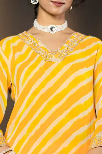  yellow leheriya print poly georgette straight suit set