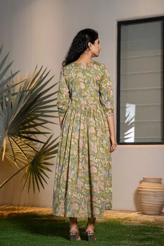  green pure cotton sequins work,dori embroidery and gathers dress