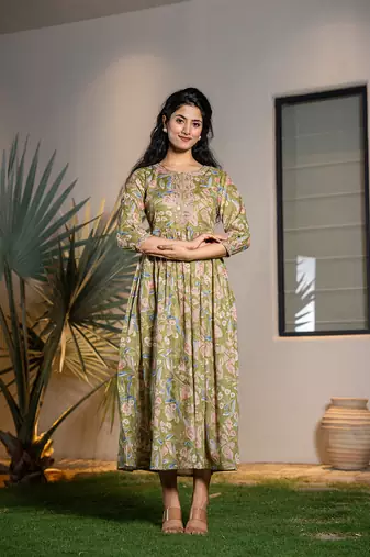  green pure cotton sequins work,dori embroidery and gathers dress